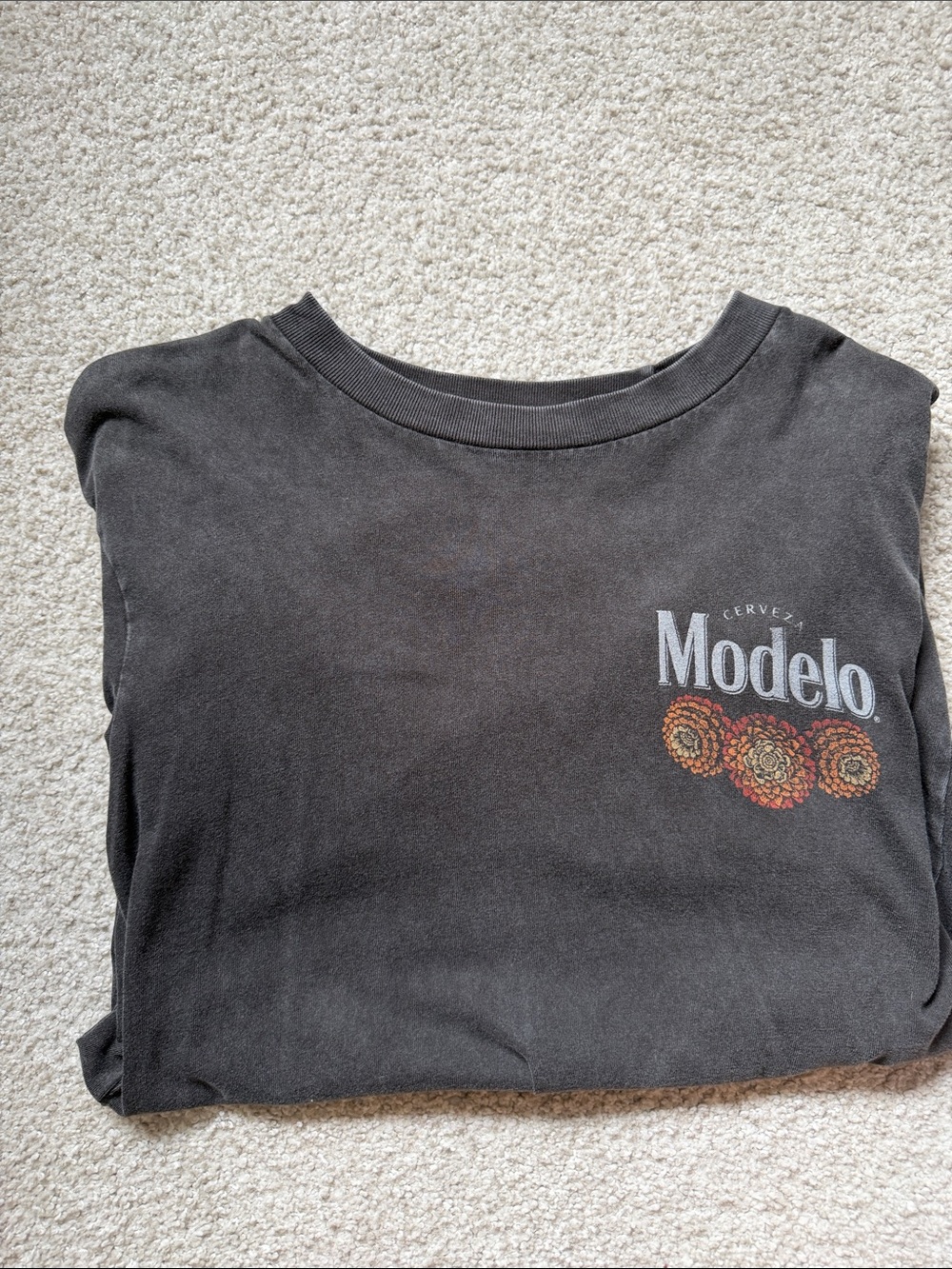 ModelCo Black Tee with Floral Logo